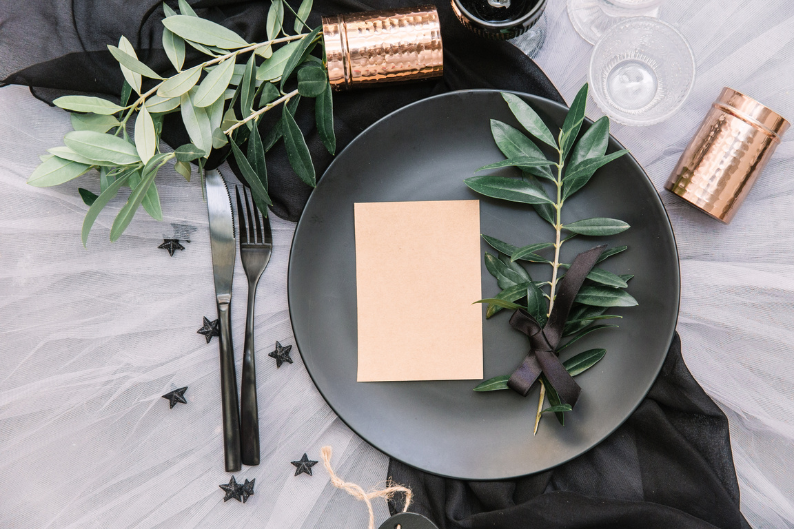 Flat lay boho wedding invitation card. Beautiful rustic wedding event table set up with decoration